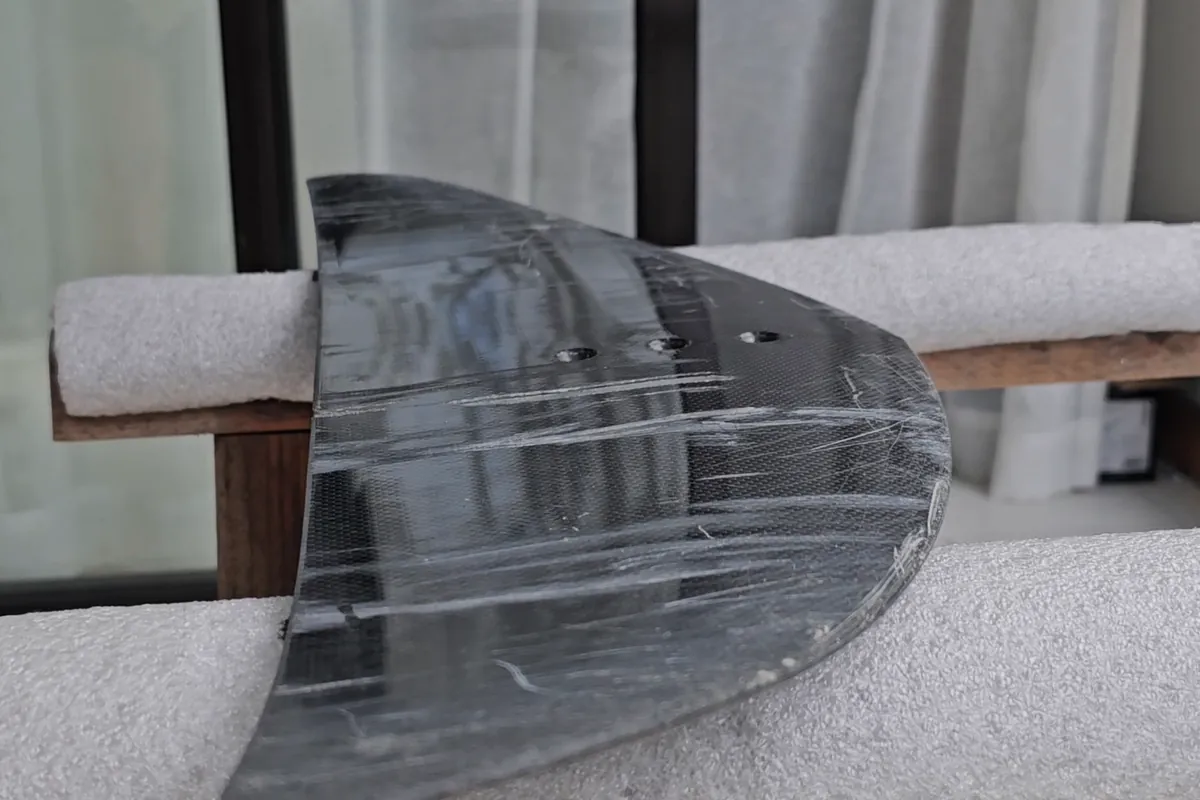 Carbon stabilizer with long scratches across the whole surface
