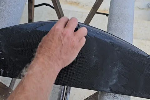 Hand finishing the front wing surface